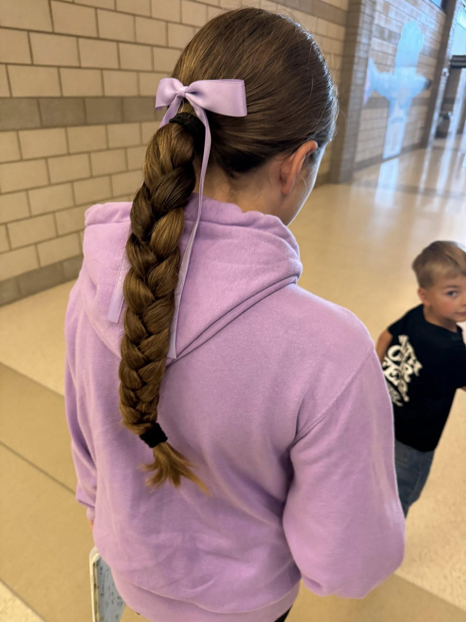 Purple bow and sweatshirt